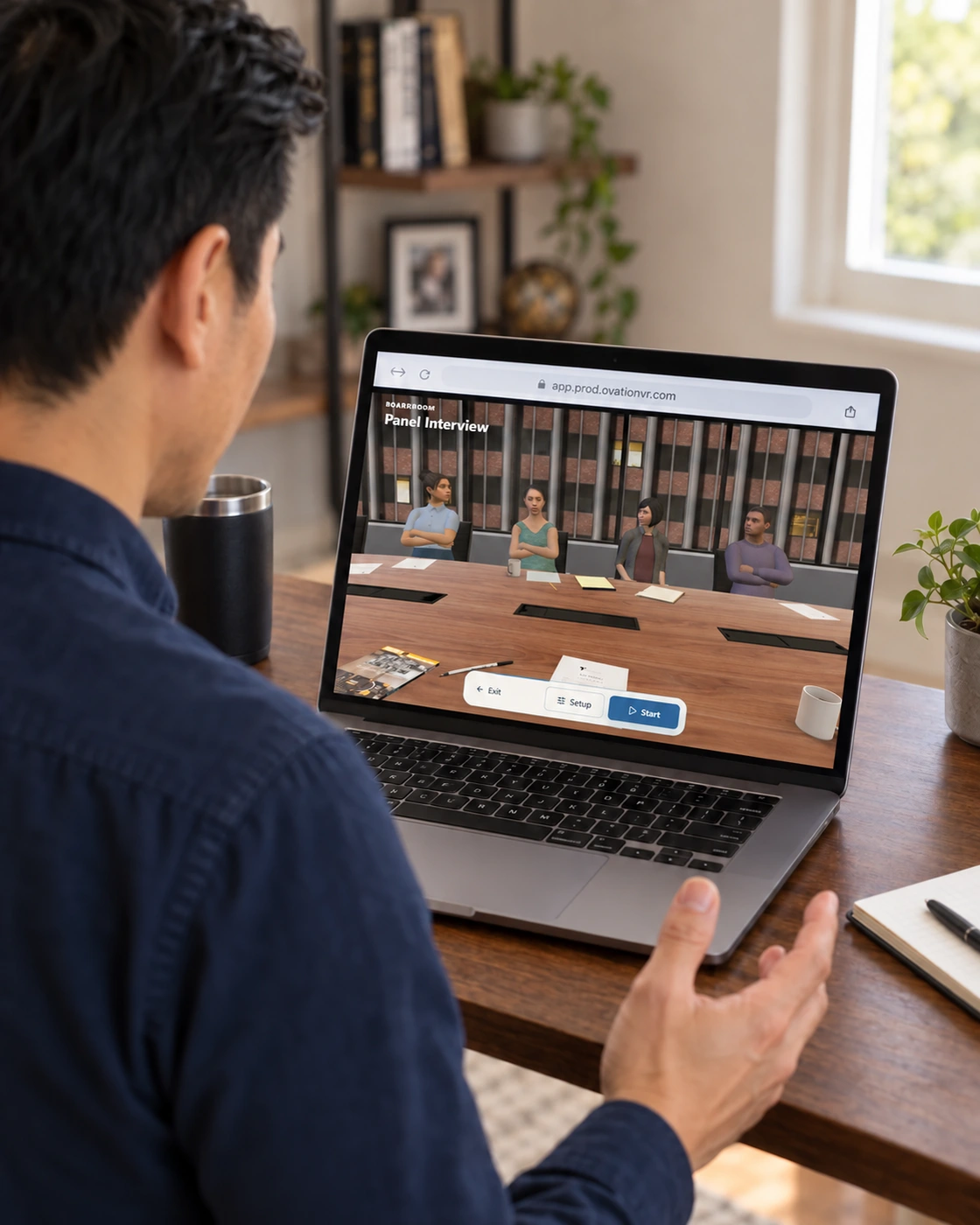 Over-the-shoulder view of a learner practicing an Ovation Panel Interview in a browser on a laptop